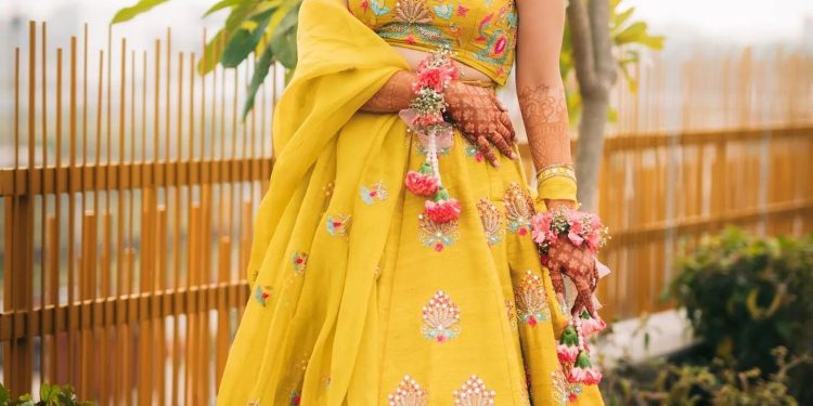 Elegance and Celebration: The Classic Black Suit vs. the Vibrant Haldi Outfit for Women